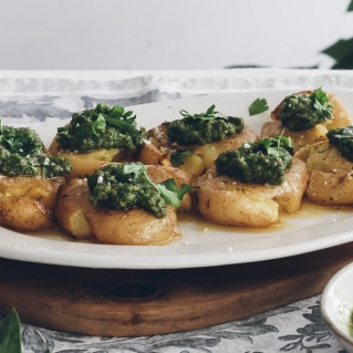 Oven-baked smashed potatoes with green pesto